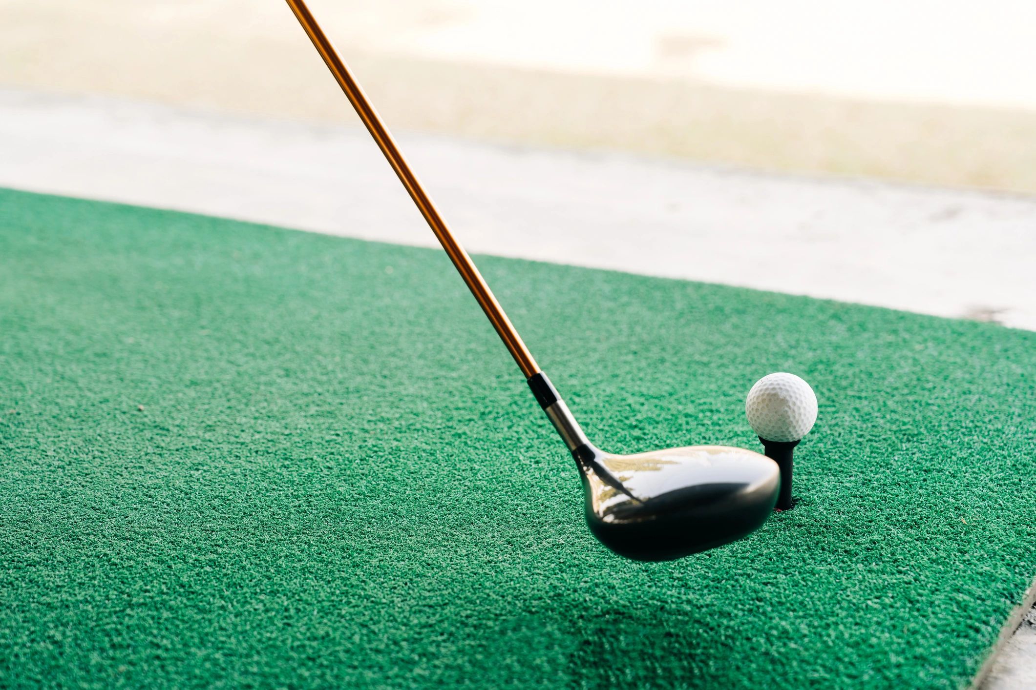 Golfer practicing on a training green